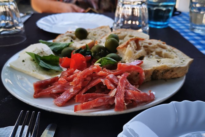 Authentic Pizza Making Class in Naples with Appetizers and Drink - Stretching the dough by hand