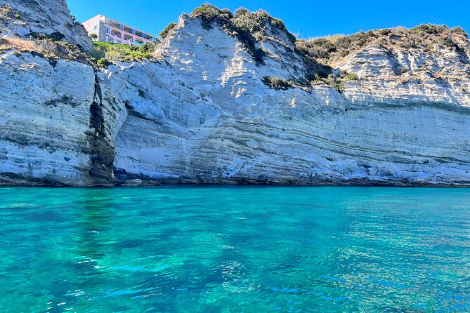 Boat Tour to Procida and Ischia, discover Private Secret Beaches - Punta di Pizzaco during the golden hour