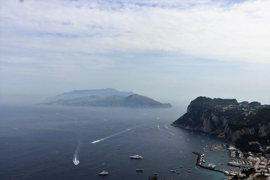From Naples: Blue Grotto, Capri, and Anacapri Group Tour - Gardens of Augustus and the Faraglioni view
