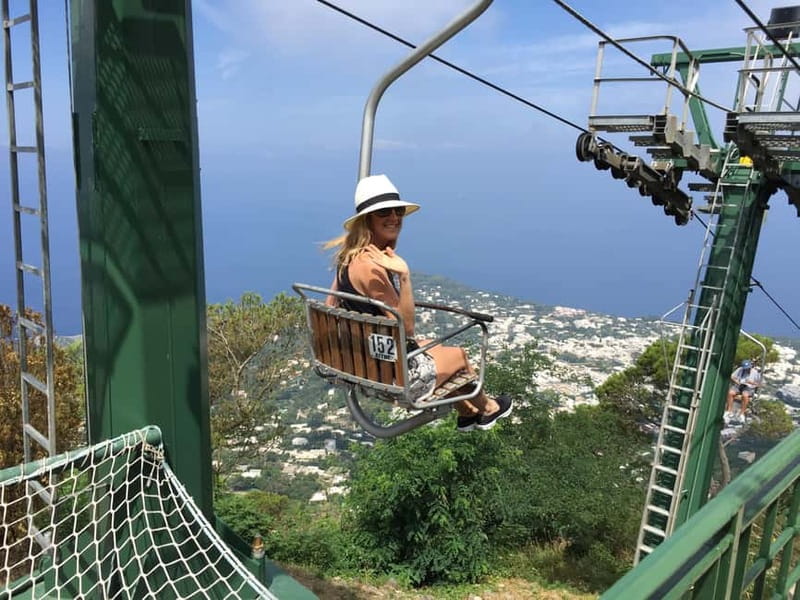 From Naples: Explore Capri with Chairlift Experience - Reaching Capri by fast ferry from Naples