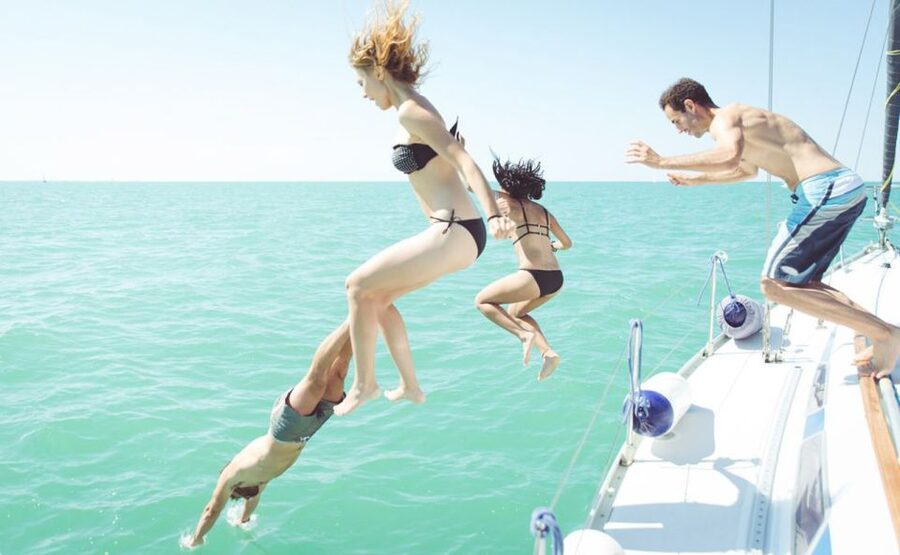 From Naples: Private Capri Boat Excursion - A seaside lunch with the boat pulled up nearby