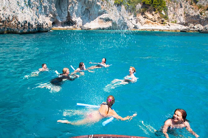 Full day Capri Island Small Group Boat Tour from Naples - The White Grotto and the first coastal views