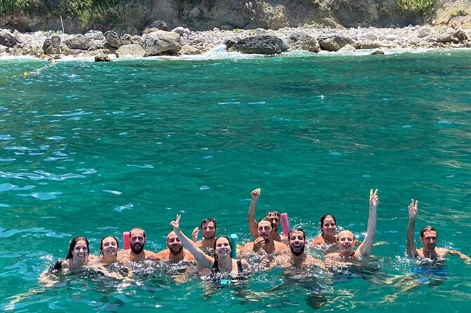 Full day Capri Island Small Group Boat Tour from Naples - The Green Grotto and Punta Carena Lighthouse