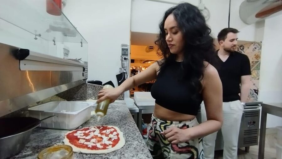 Naples: Pizza Making Class with Neapolitan Chef and drink - Stretching the thin Neapolitan base