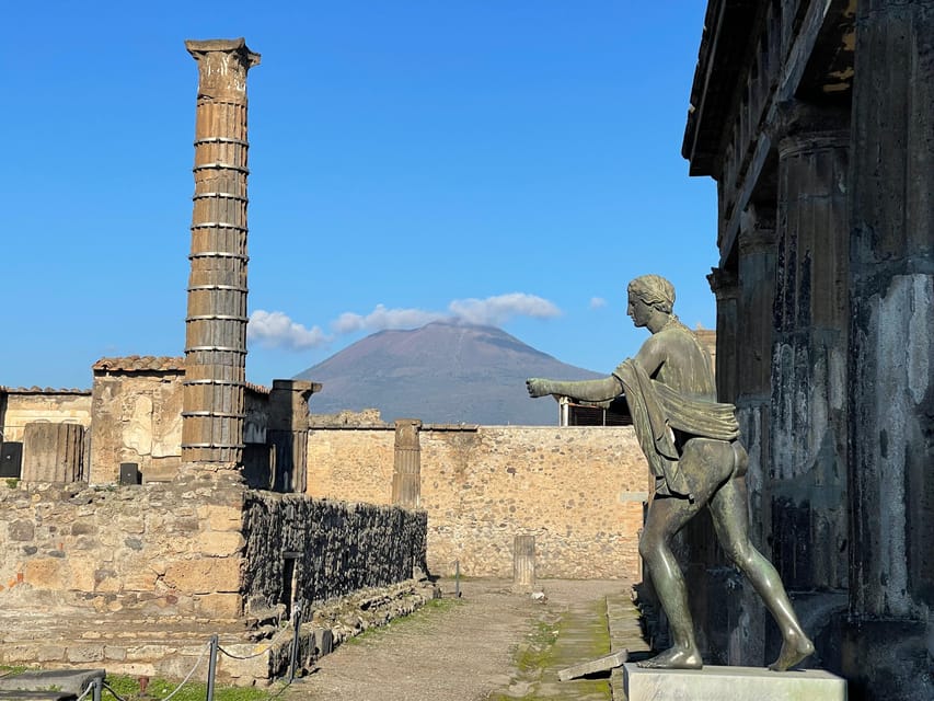 Naples: Pompeii Archaeology Park Tour & Skip-the-Line Entry - The Amphitheater and Pompeii’s scale