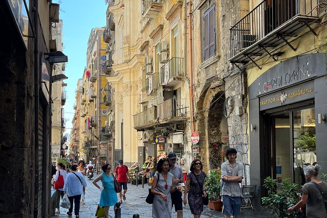 Naples Stress-Free Tour: Between Mystery, Legends & History - Pulcinella, a photo, and open-legs lemonade