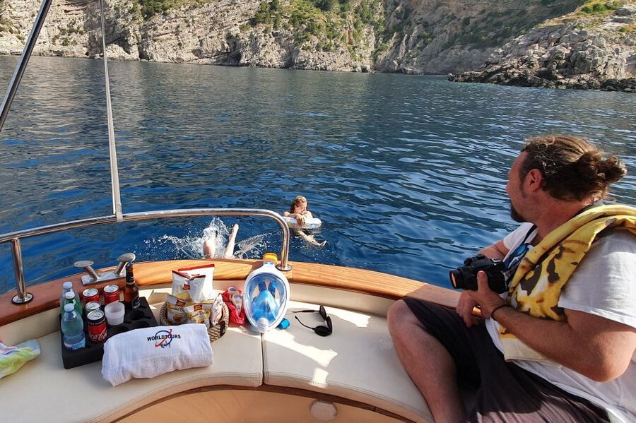 Naples: Sunset Cruise by boat with Aperol Spritz and Snacks - Trentaremi Bay and the old tuff quarries
