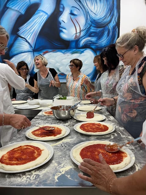 Pizza-Making Workshop by night with glass of wine - Kneading dough with the chef
