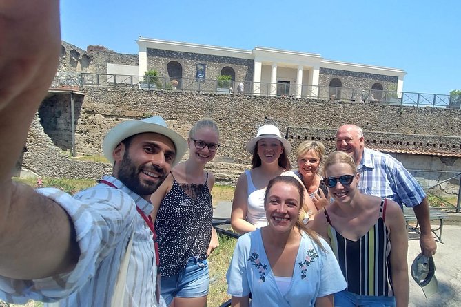 Pompeii Ancient City Walking Tour – Italian & English Guide - The Roman amphitheater and the crowd above the sand