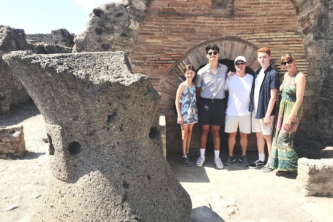 Pompeii and Herculaneum Private Tour with Native Guide and Skip the Line Tickets - Pompeii’s streets, theater, baths, and shops