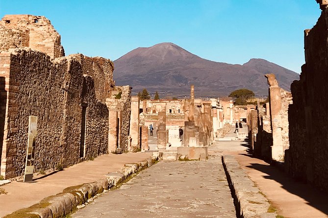 PompeiI Exclusive Tour with your Archaeologist in a Small Group - The Temple of Jupiter and the view toward Vesuvius