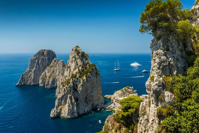 Private Boat Tour from Naples to Capri Onboard Tornado 50 - Passing the Faraglioni Rocks