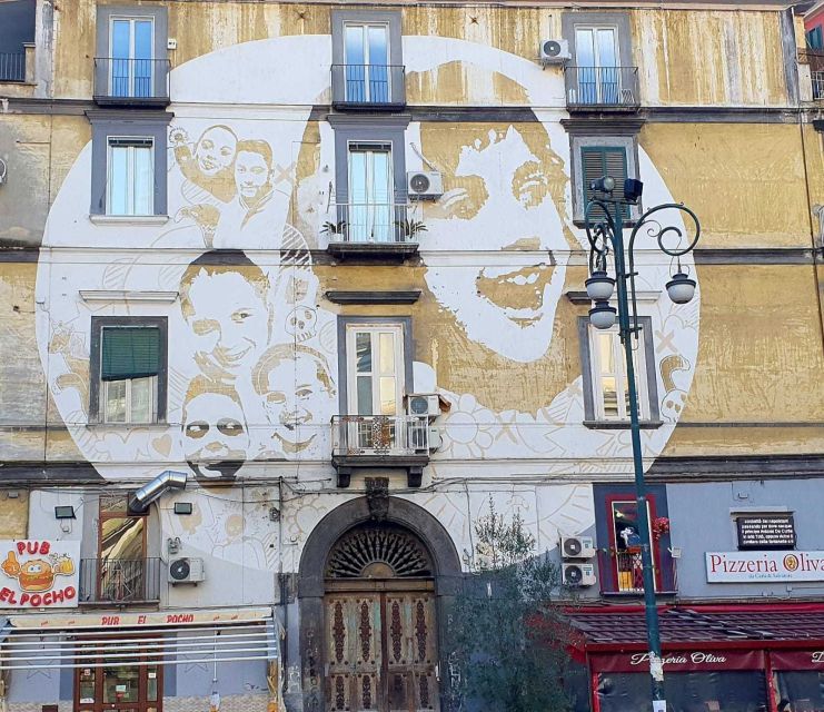 Rione Sanità tour among baroque, revival, street art & food - Churches, murals, and laundry overhead